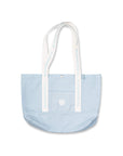 Light blue tote bag with white handles on a white background