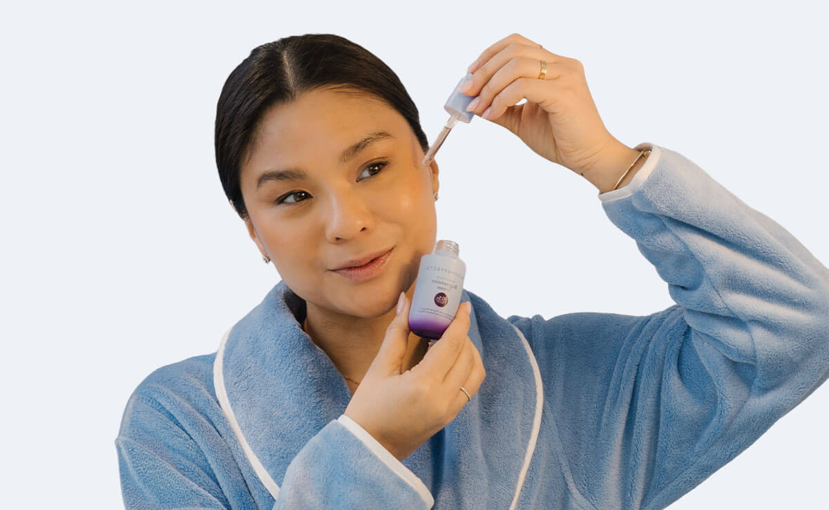 Founder Kim van Haaster applying Black Tulip Regenerative Serum
