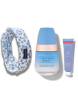Beauty product set with dew Drops, Tulip Tint, and headband on a white background