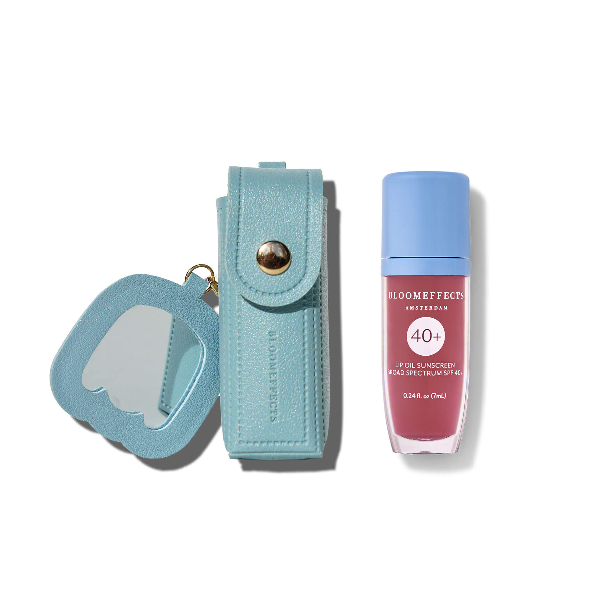 Lip balm with a blue case and pink lip balm on a white background