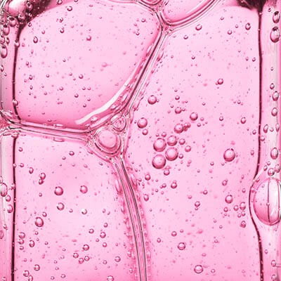 Close-up of pink bubbles on a pink background
